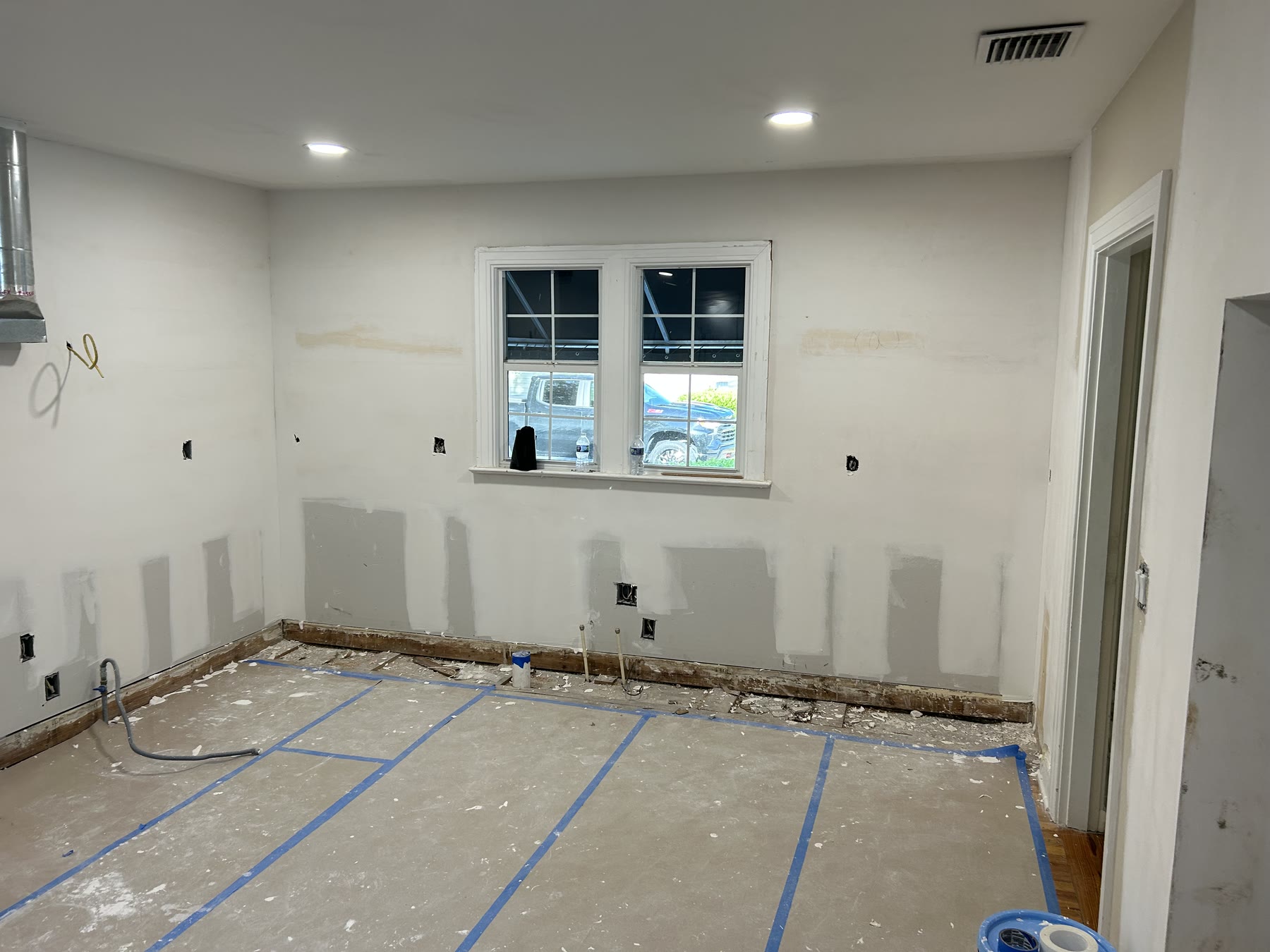 South Tampa kitchen mid-remodel with new drywall, recessed lighting and electrical rough-in by 618 Construction